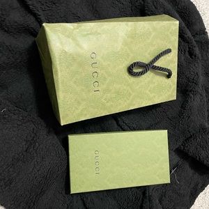 Authentic Gucci Wallet new. No wear marks. Traditional Gucci pattern